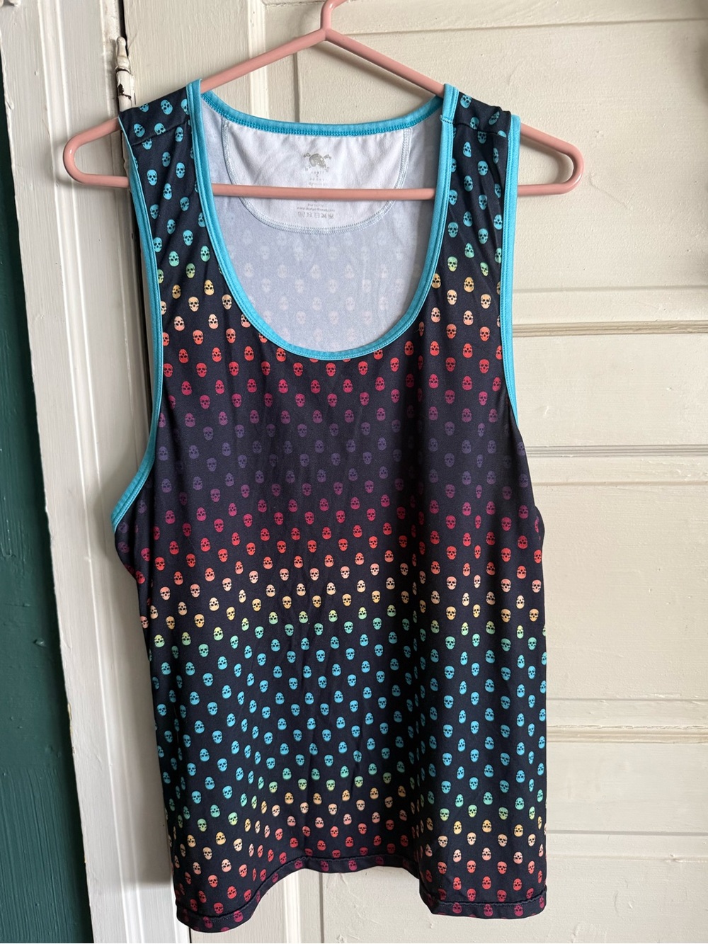Men’s Skull & Bones razor back tank. It is a men’s size large.